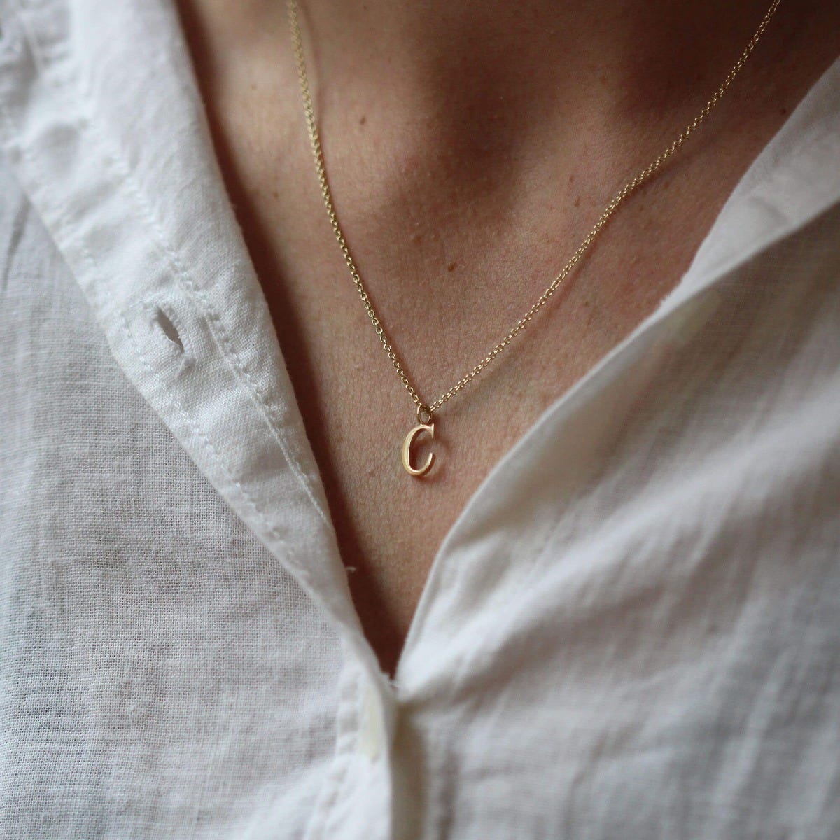 One sales initial necklace