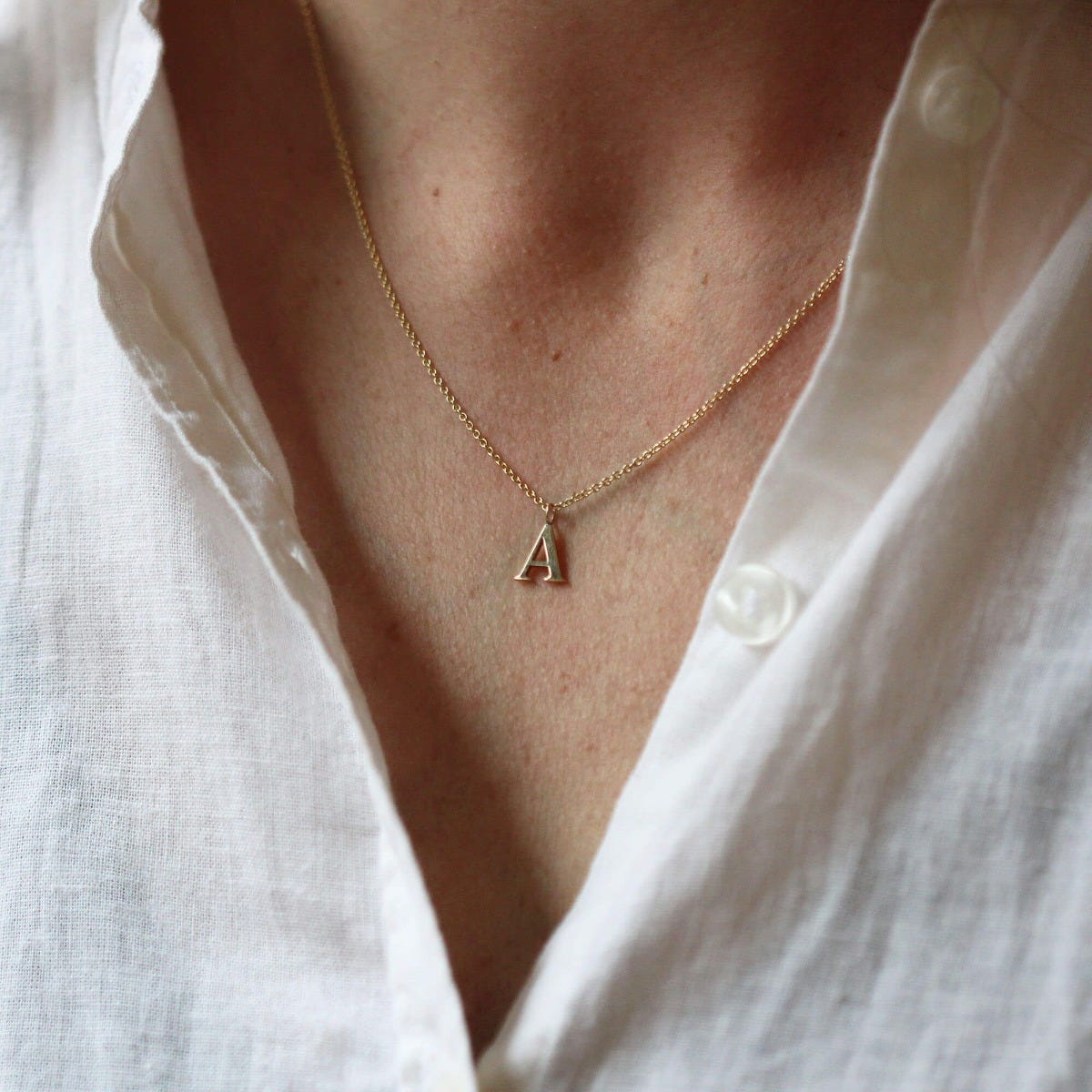 One sales initial necklace