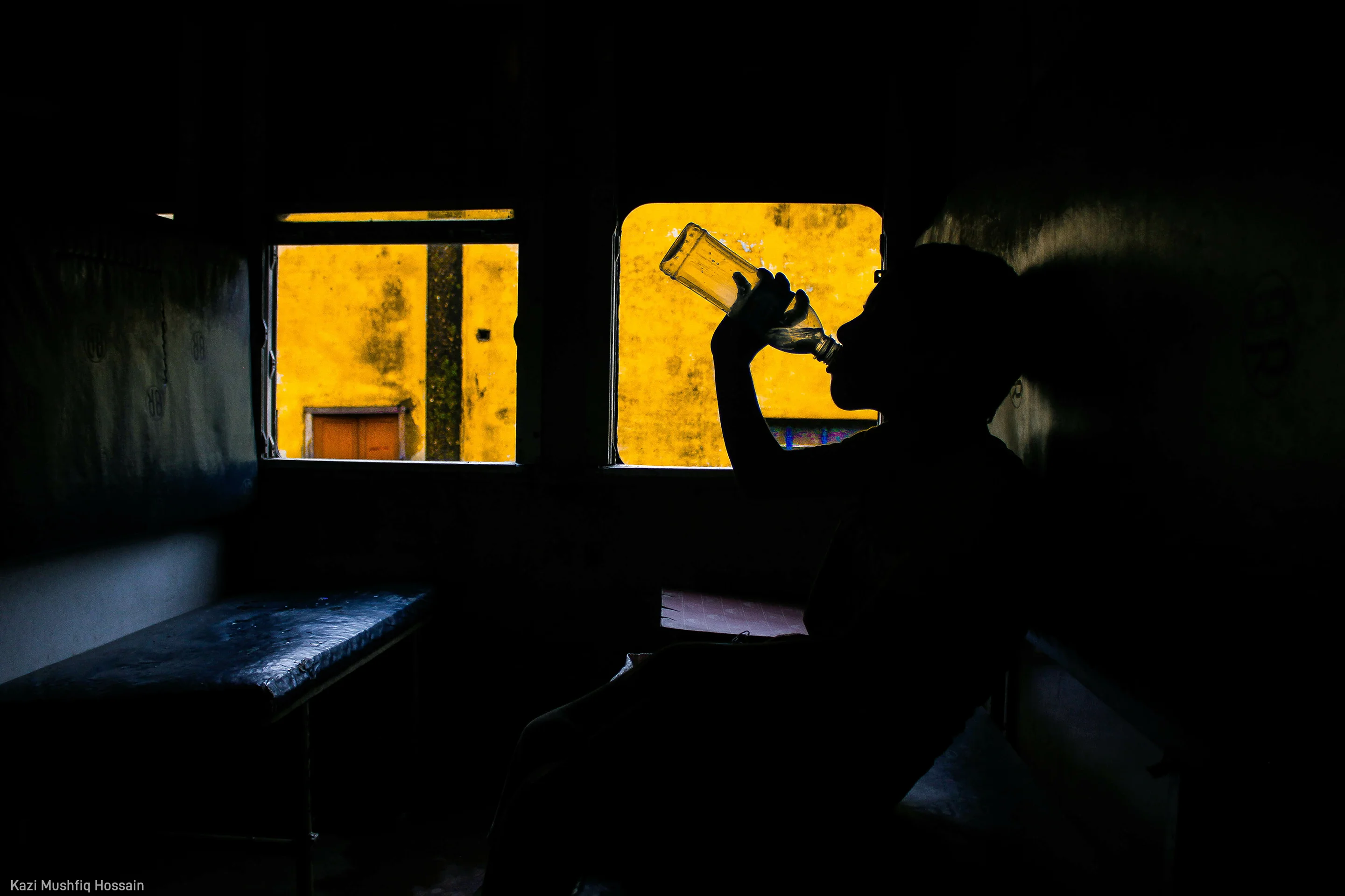 Kazi Mushfiq Hossain | A boy quenching his thirst with refreshing water in the scorching heat