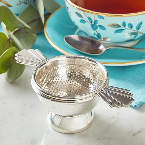 Beautiful silver tea strainer exclusively designed for Fortnum's